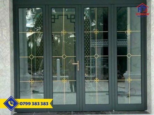 Cửa đi nhôm Xingfa mở quay trang trí nan đồng